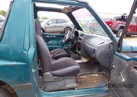 1998 Chevrolet Tracker Base Cmi из США, поврежденный, VIN 2CNBE1865W6925992